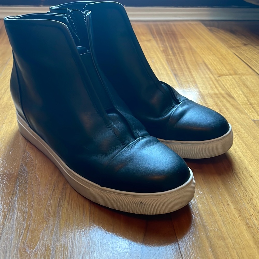 Simple black and white ankle bootie with inside zipper